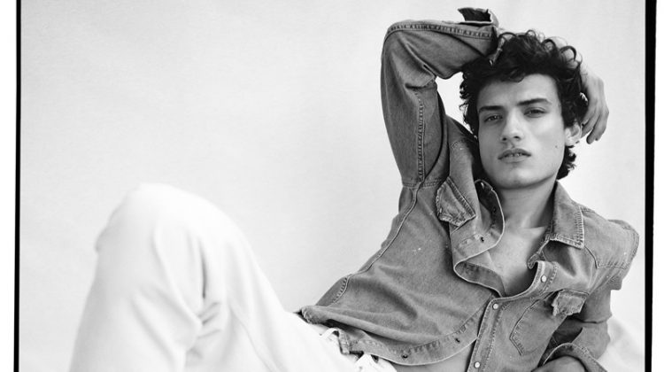 Doubling down on denim, Serge Rigvava inspires in white jeans by Pepe Jeans.