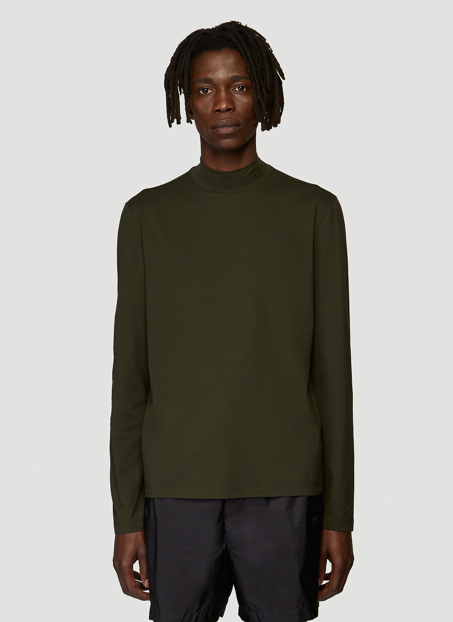 dark green mock neck top