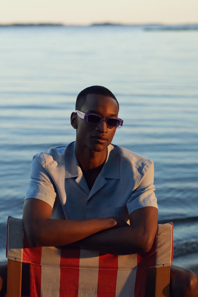 Oliver Kumbi sports stylish sunglasses from the H&M x CHIMI collaboration.