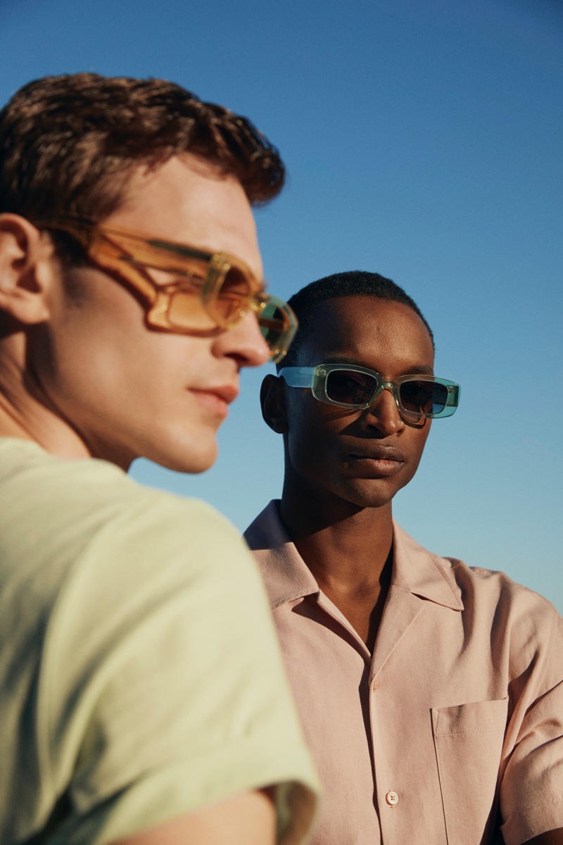 Bo Develius and Oliver Kumbi model sunglasses from the H&M x CHIMI collaboration.