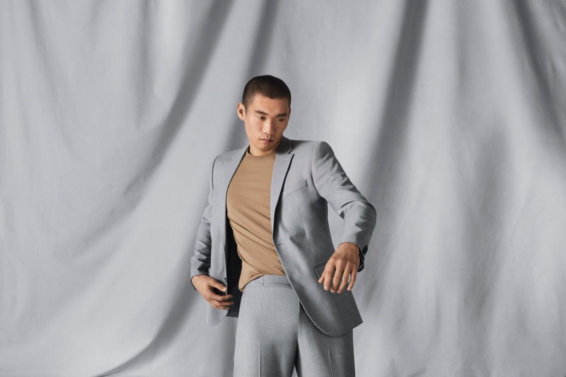 Model Kamui Tanaka showcases breathable suiting from H&M's Coolmax summer range.
