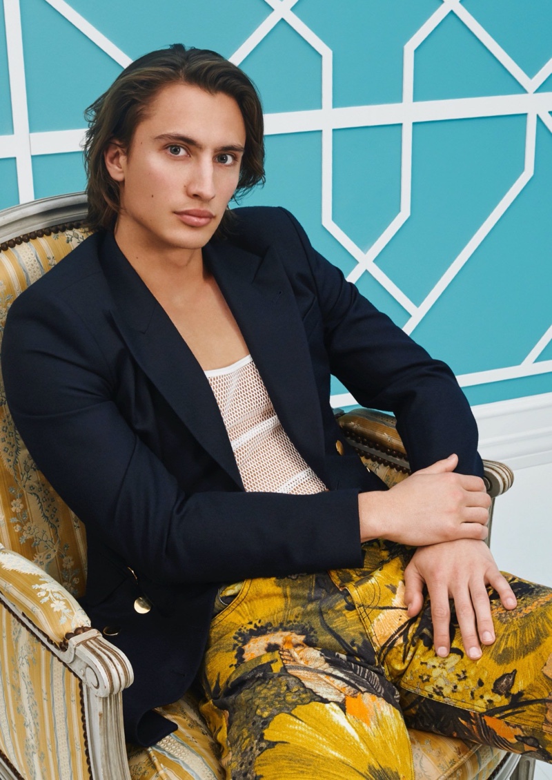James Turlington sports a blazer with printed pants from Dries Van Noten for Holt Renfrew.