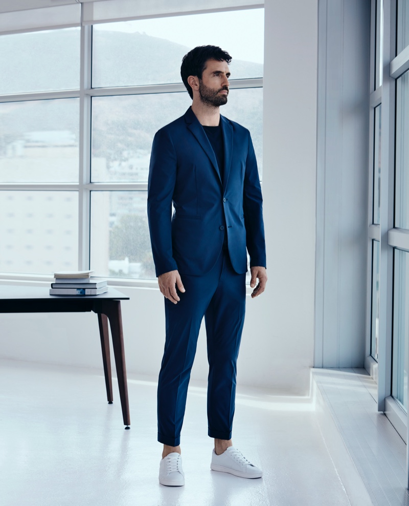 A smart vision, Stewart Masters dons a suit from Mango for the label's Improved collection campaign.