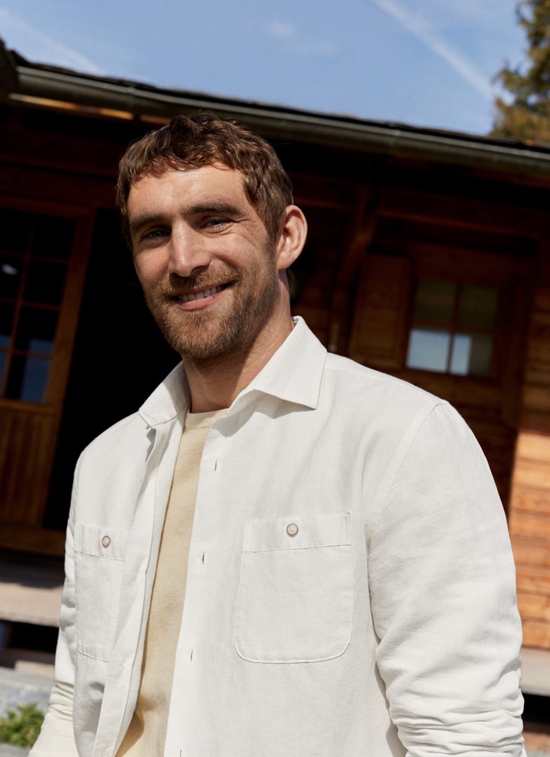 All smiles, Will Chalker sports a pocket textured t-shirt with a linen shirt from Mango.