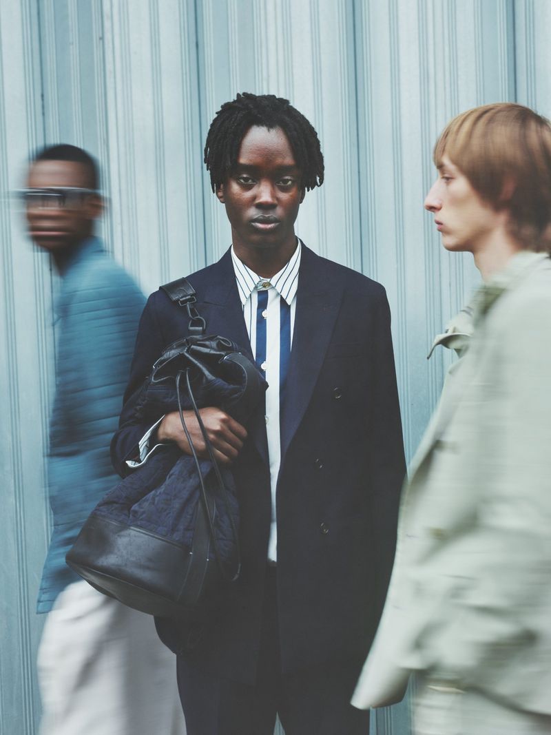 Models Winston Lawrence, Mo M'bengue, and Josef Ptacek come together in summer tailoring from Paul Smith.