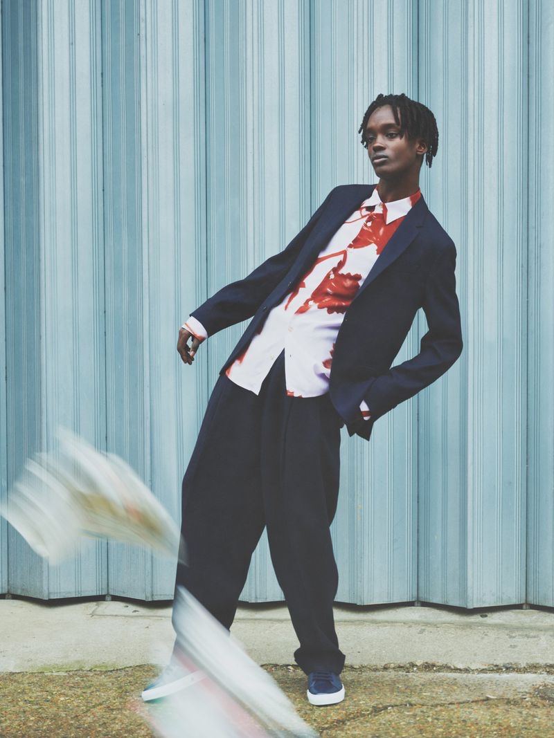 Mo M'bengue dons relaxed summer tailoring by Paul Smith.