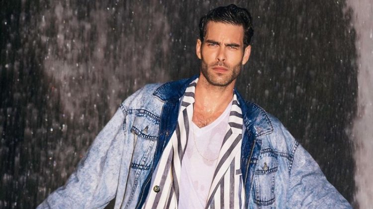 Miami Vice meets the Fresh Prince of Bel-Air as Jon Kortajarena dons a striped suit with a denim jacket for Balmain's resort 2021 campaign.