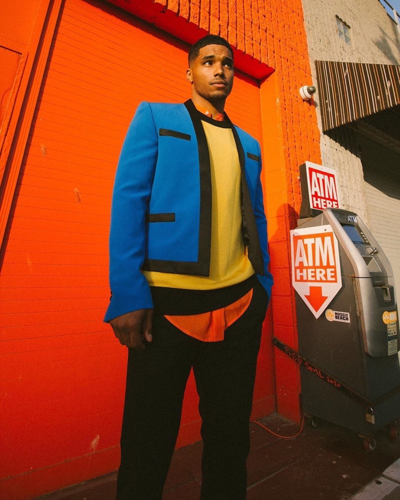 Rome Flynn makes a bold statement in a color-blocked look for Balmain's resort 2021 campaign.