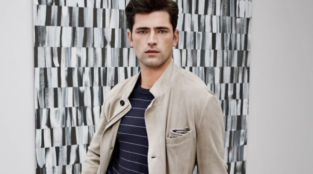 Holt Renfrew Paints a Sleek Picture with Eleventy Sean O'Pry sports a striped wool sweater, stretch wool cargo pants, and sneakers from Eleventy.