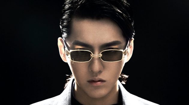 Gentle Wu: Kris Wu Stars in Gentle Monster Campaign Channeling a sci-fi vibe, Kris Wu rocks the GW 002 03 rectangular gold metal framed sunglasses from his Gentle Monster collaboration.
