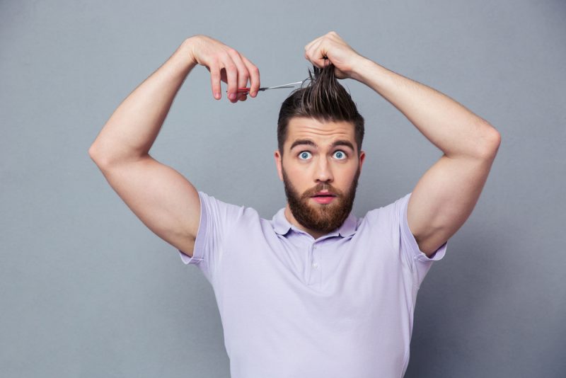 cutting hair with scissors