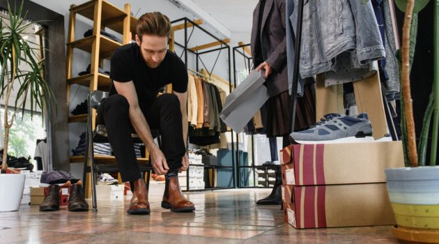 A Quick Guide to Buying a New Pair of Shoes Man Trying on Shoes at Store