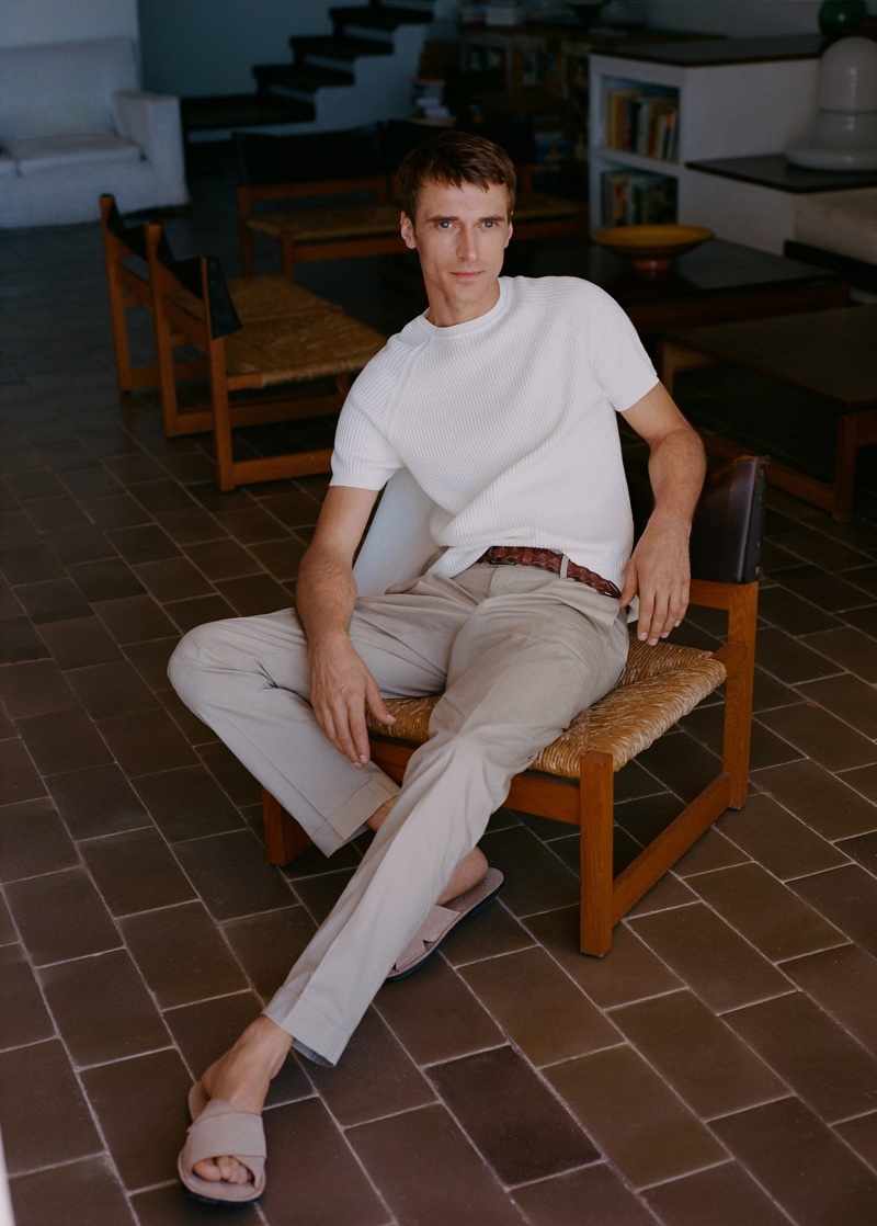 Front and center, Clément Chabernaud models Mango's slim-fit cotton pants with a short-sleeve sweater.