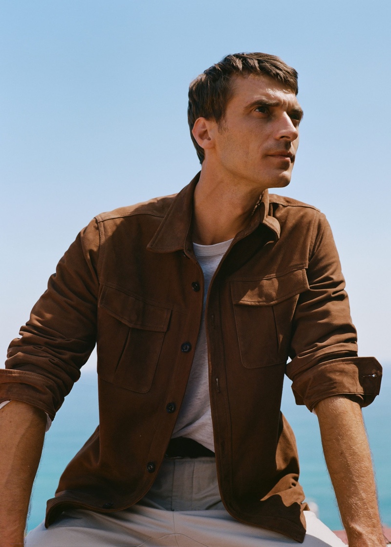 Clément Chabernaud dons a suede effect jacket from Mango.