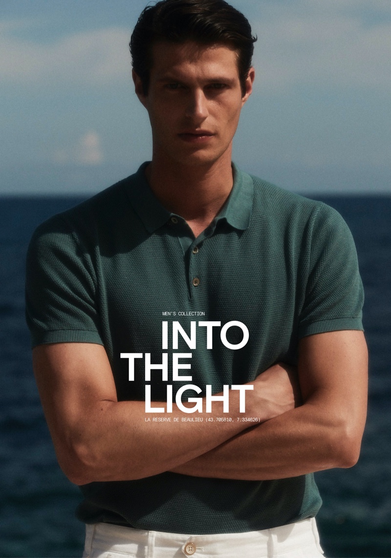 Front and center, Mattia Regonaschi models a short-sleeve Massimo Dutti polo sweater with Bermuda shorts.