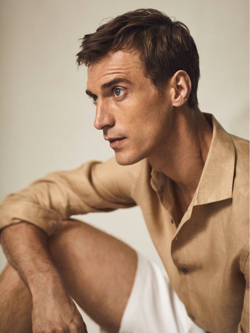 French model Clément Chabernaud sports a Massimo Dutti 100% linen slim-fit shirt.