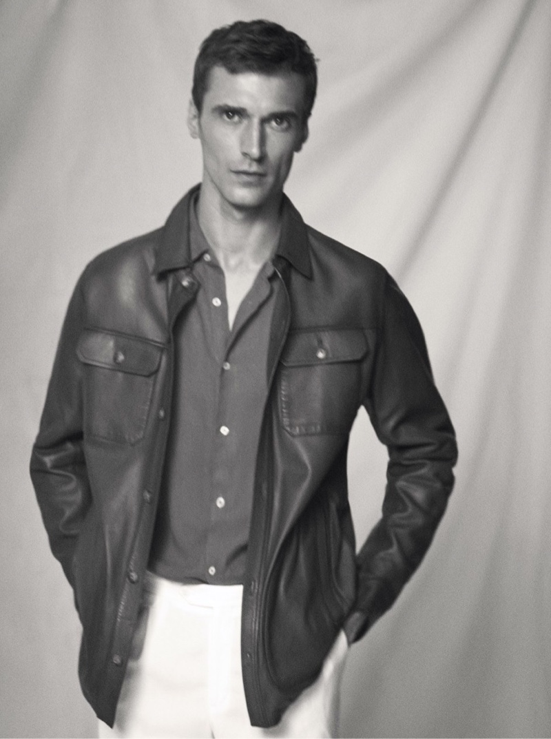 Clément Chabernaud dons a brown leather overshirt from Massimo Dutti.