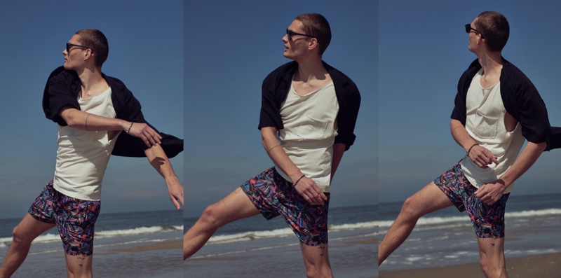 Taking to the beach, William Los sports swim shorts and more from Pull & Bear.