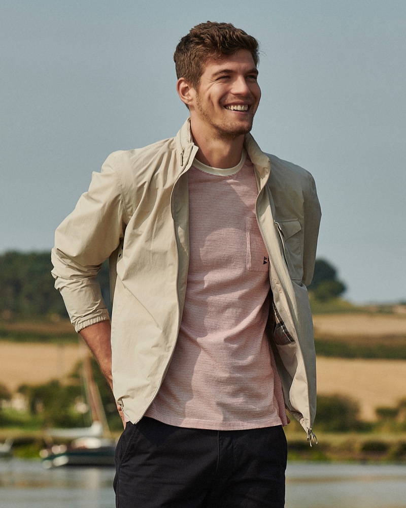 All smiles, Bertold Zahoran sports a waterproof jacket and striped pocket t-shirt by Barbour.All smiles, Bertold Zahoran sports a waterproof jacket and striped pocket t-shirt by Barbour.