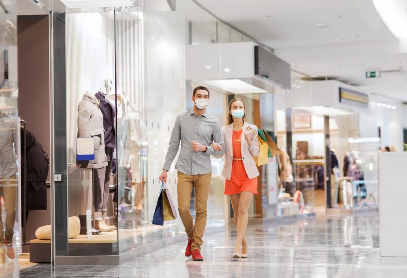 Couple Shopping at Mall with Masks