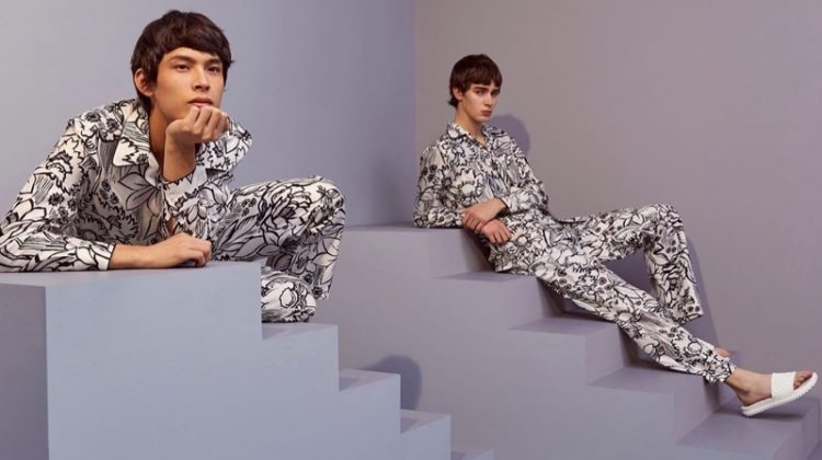 Models Yang Hao and Mitchell Gorthy don graphic black and white looks from Fendi's pre-fall 2020 collection.