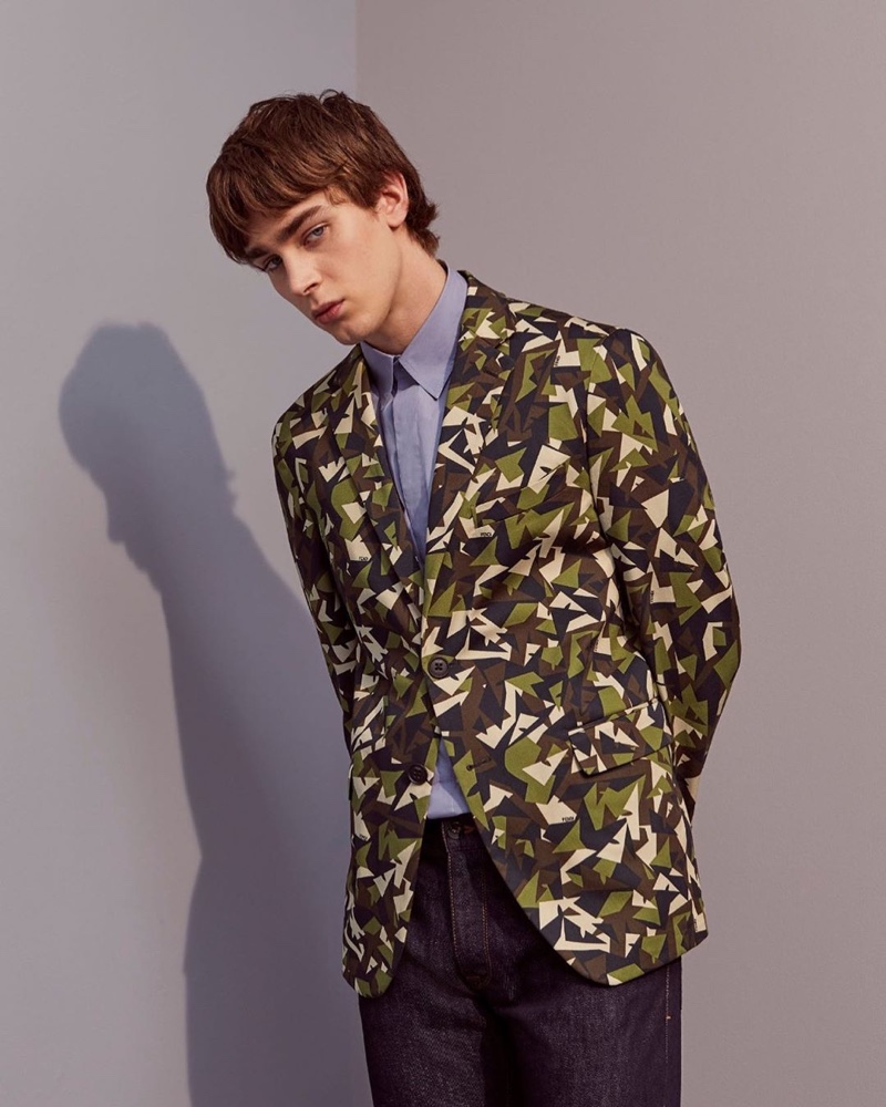 Mitchell Gorthy inspires in a modern camouflage print suit jacket from Fendi's pre-fall 2020 collection.