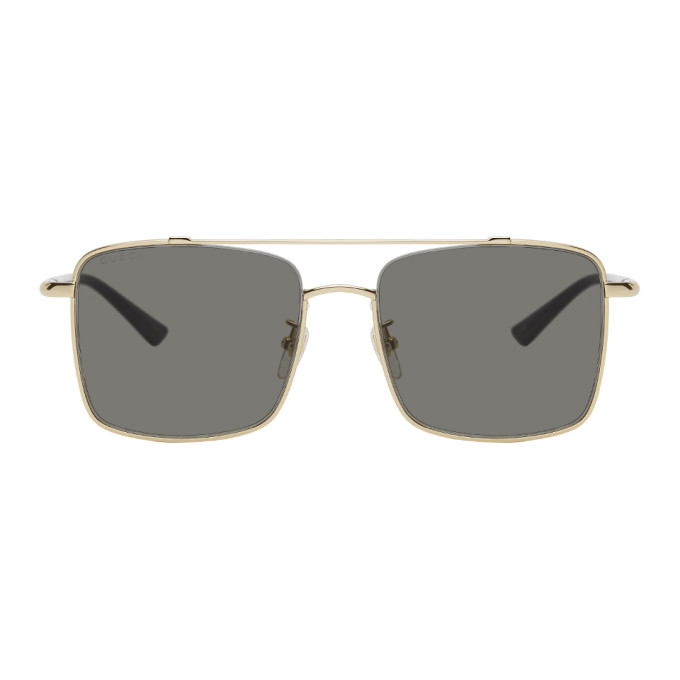 gucci gold and black sunglasses