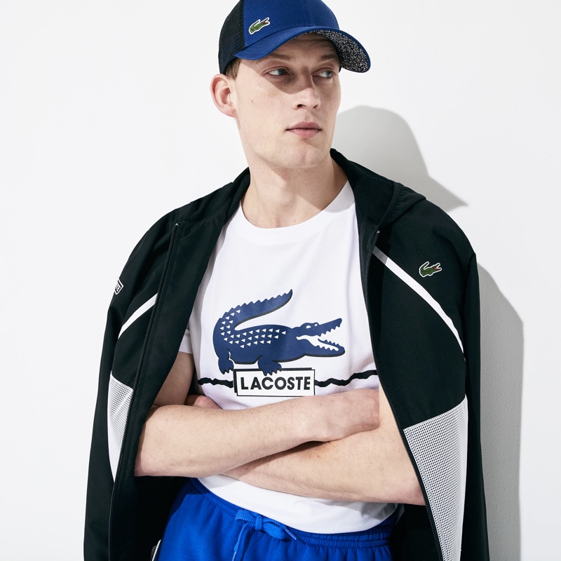 Bastian Thiery goes sporty in an oversize croc crewneck T-shirt from Lacoste.
