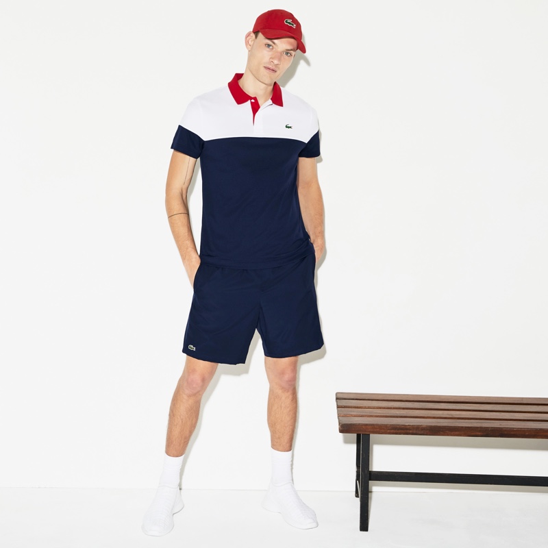 William Los embraces classic Lacoste style in the brand's sport tennis shorts. » Cruise Into Summer with the Lacoste Sale William Los embraces classic Lacoste style in the brand's sport tennis shorts.