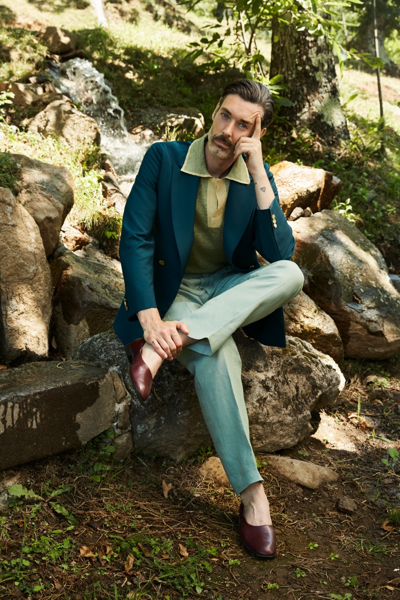 Front and center, Richard Biedul wears a tailored look from Luca Larenza's spring-summer 2021 collection.