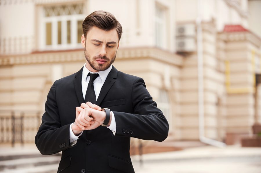 Man Wearing Suit and Watch