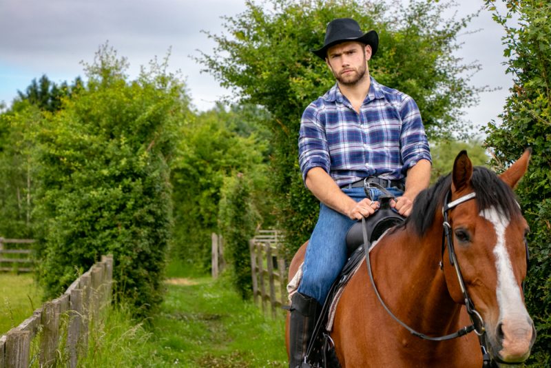 Man in Riding Boots on Horse