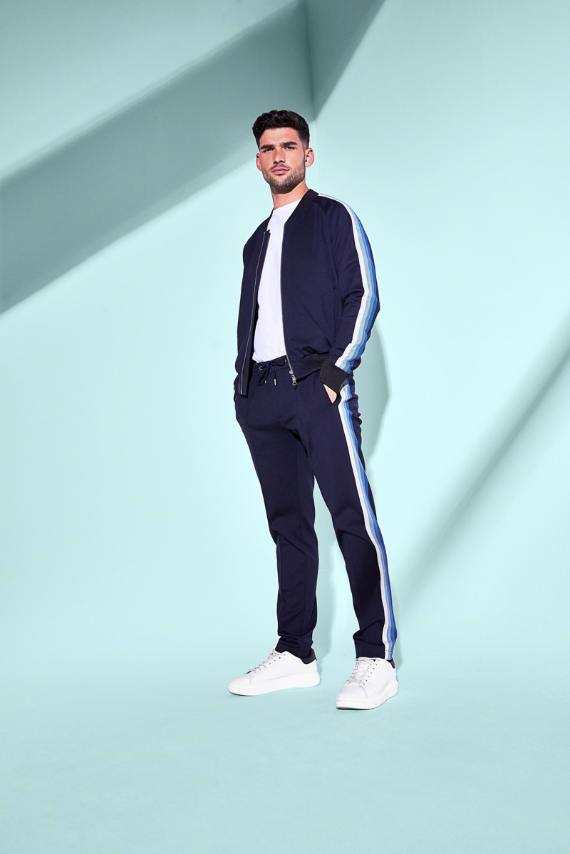 Going sporty, Brandan Stevens wears a look from River Island.