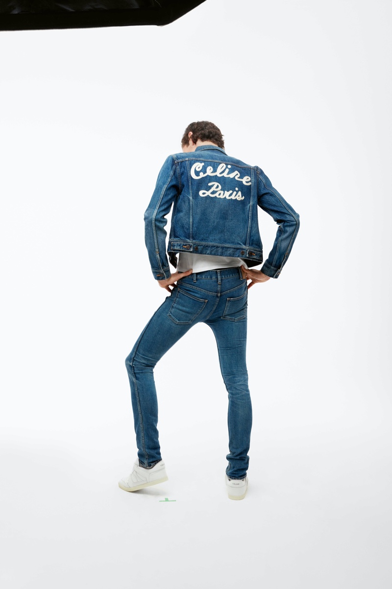 Going casual, Emil rocks a denim jacket, shirt, jeans, and sneakers from Celine for APROPOS Journal.