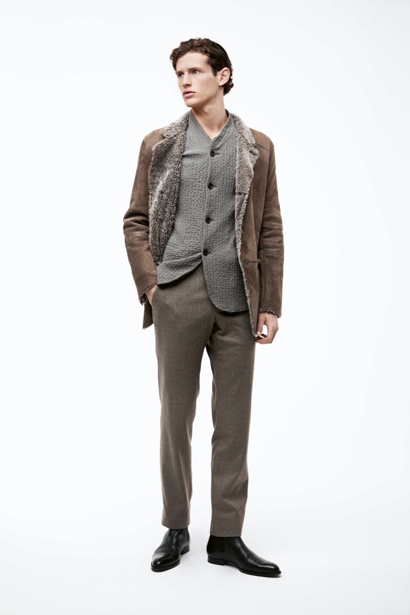 A chic vision, Emil models a jacket, blazer, and pants from Giorgio Armani for APROPOS Journal.