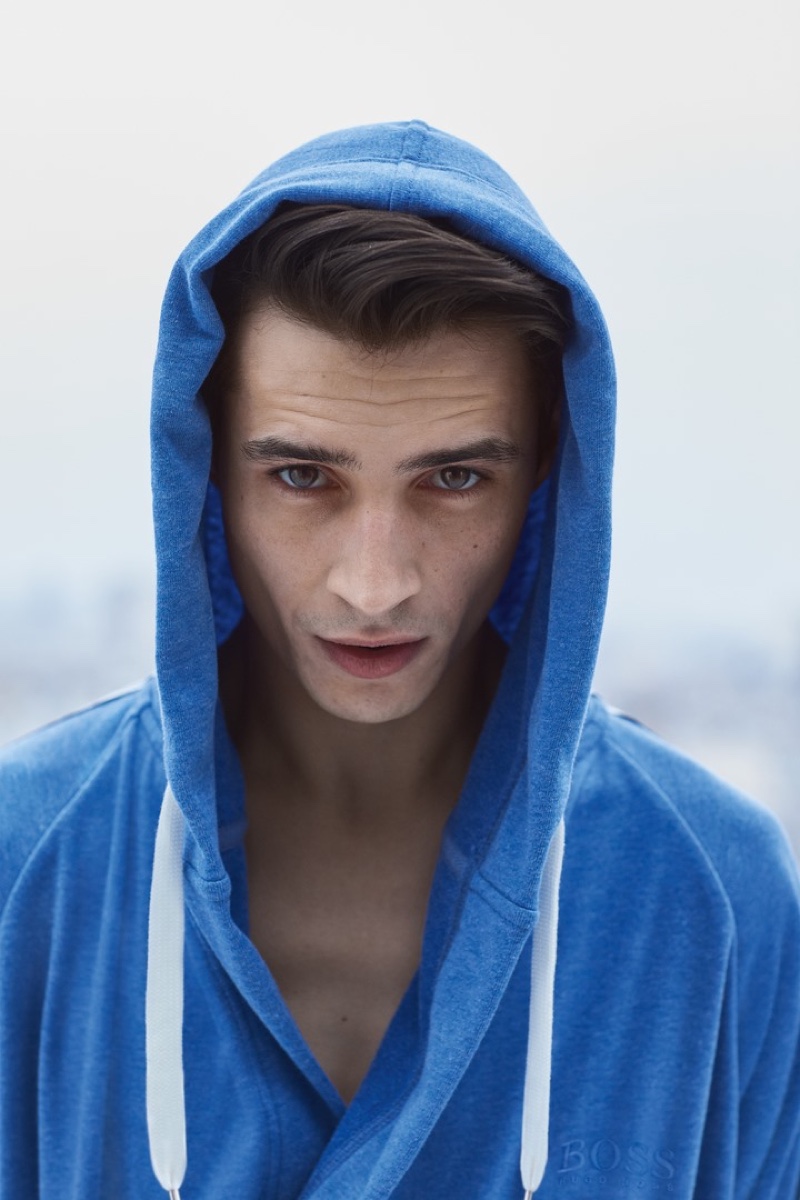 French model Adrien Sahores dons a blue bathrobe from BOSS.