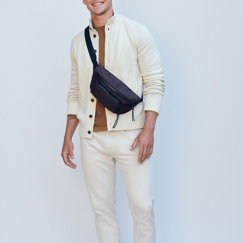 Model Mitchell Slaggert sports a cream-colored look from Banana Republic.