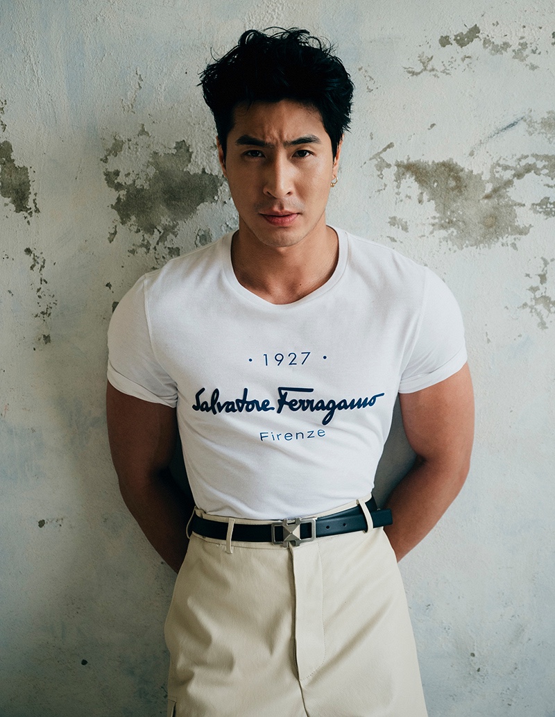 Front and center, Chris Pang wears a t-shirt with leather pants and a belt by Salvatore Ferragamo for Esquire Singapore.