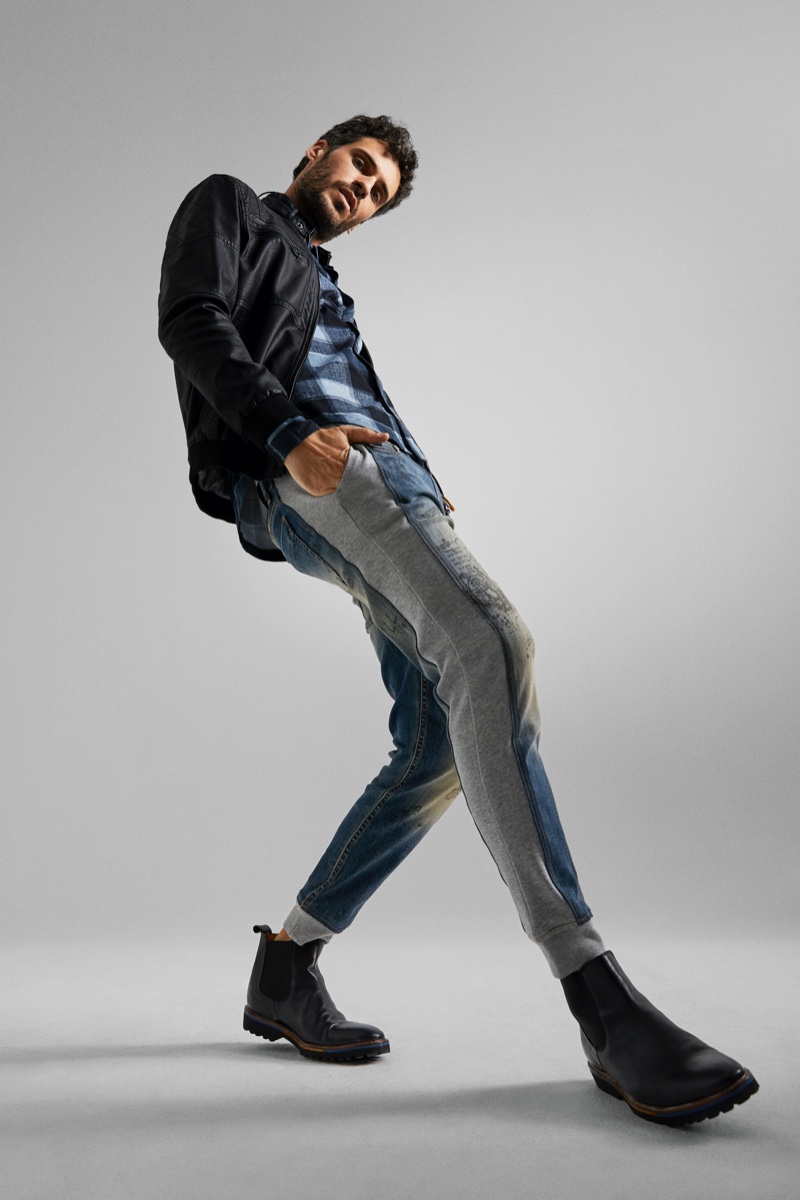 Florent Lahmeri models a pair of Desigual's hybrid denim joggers.