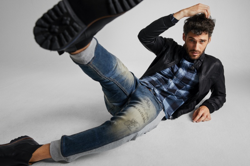 Model Florent Lahmeri sports Desigual's hybrid denim joggers.