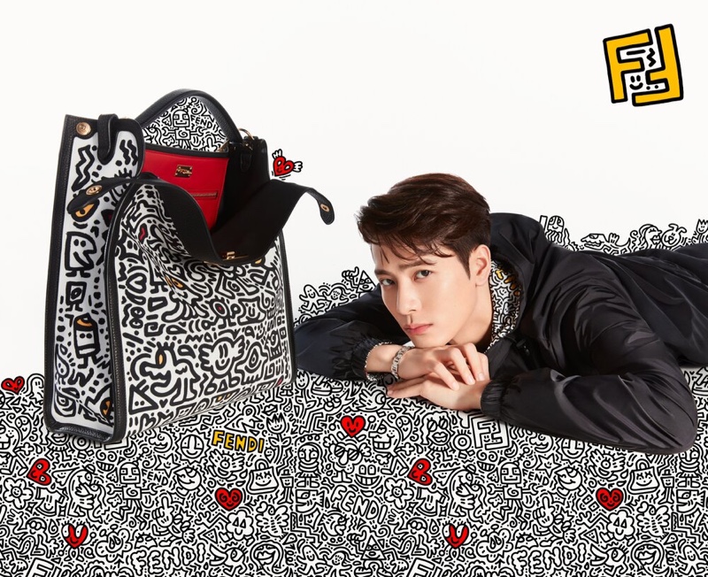 Posing next to a covetable Mr. Doodle bag, Jackson Wang fronts Fendi's latest campaign.