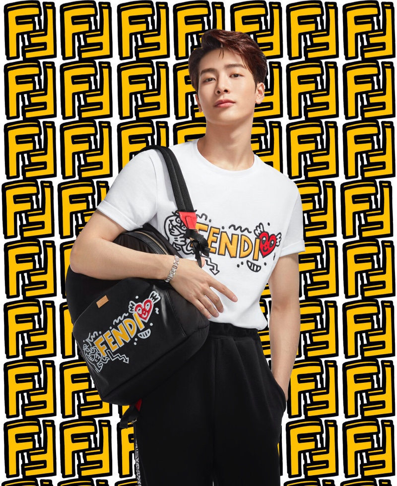 Jackson Wang rocks a graphic t-shirt and backpack from Fendi's Mr. Doodle capsule collection.