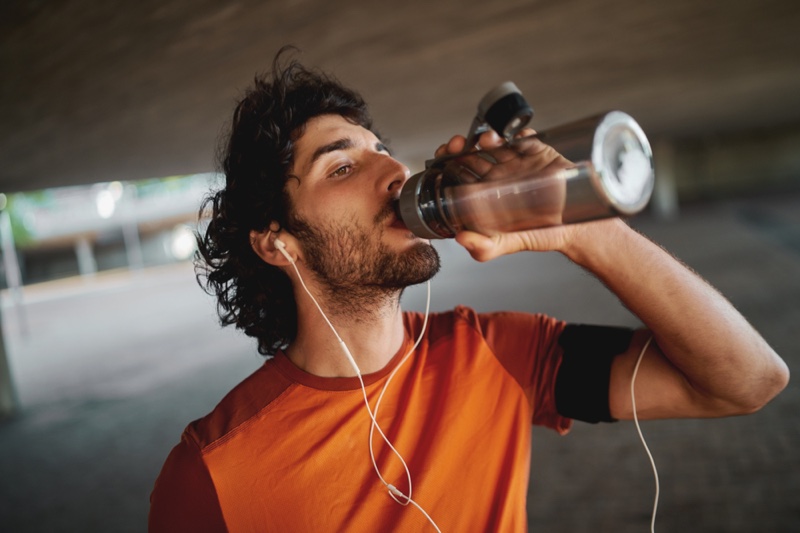 Man Drinking Reusable Water Bottle