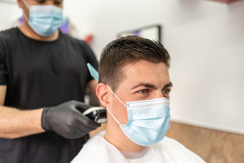 Man Getting Hair Cut Wearing Mask