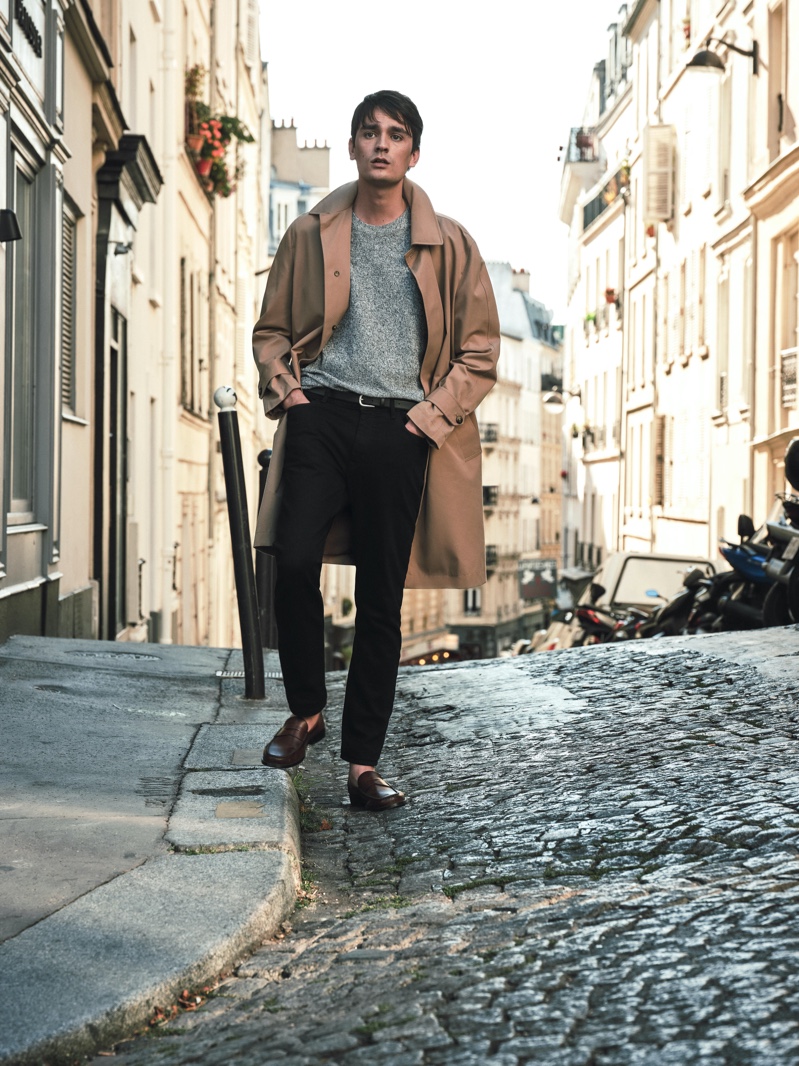 Stepping outside into the Parisian streets, Alain-Fabien Delon sports a trench coat and more essentials from Mango Man.