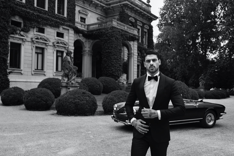 Actor Michele Morrone suits up in a sharp tuxedo for GUESS' fall-winter 2020 campaign.