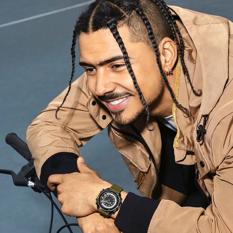 All smiles, Quincy Brown fronts Coach's C001 watch campaign.