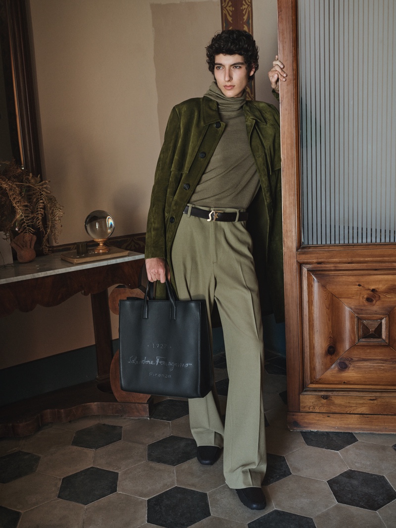 Model Mario Lopez takes hold of a leather tote from Salvatore Ferragamo's Tornabuoni 1927 collection.