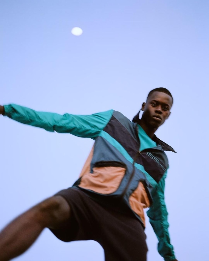 Going sporty in a color-block jacket, Alpha Dia fronts Scotch & Soda's pre-fall 2020 campaign.