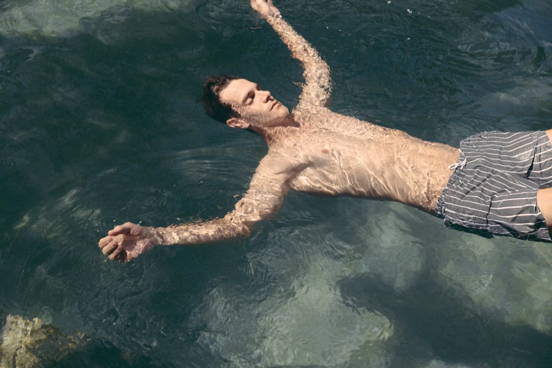 Swimming, Vincent Lacrocq wears gray striped swim shorts by Zara. » Vincent Travels to Bali with Zara for Summer Holiday Swimming, Vincent Lacrocq wears gray striped swim shorts by Zara.